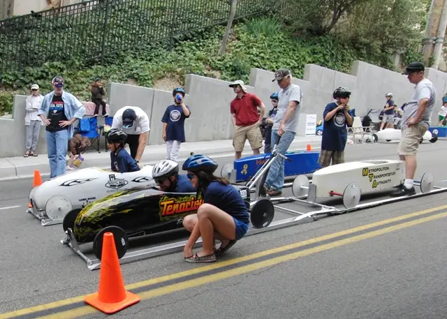 Modern soap box derby racers lined up before a race